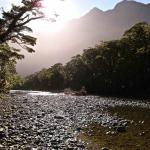 early morning sun rising over the peaks